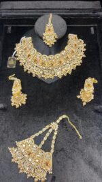 Royal Gold Plated Kundan Bridal Jewelry Set with Pink Stone Accents
