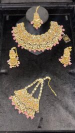 Royal Gold Plated Kundan Bridal Jewelry Set with Pink Stone Accents - Image 3