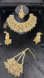 Royal Gold Plated Kundan Bridal Jewelry Set with Pink Stone Accents - Image 2